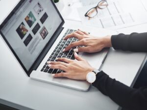 Hands,,Computer,And,Typing,At,Desk,For,Remote,Work,,Research